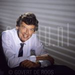 09-08-1985 Wim Kok at studio in Amsterdam.

[keywords]Posed, Half Length, Eyecontact, Smiling, Politician[/keywords]